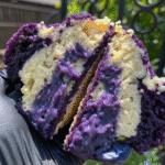 NYC Style Coconut Cookie with ube filling on cooling rack