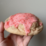 Cherry Pop-Tart Cookies stuffed with cherry pie bars, topped with pink glaze and sprinkles