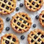 Easy Mini Blueberry Pies Recipe (Made In Muffin Tin!) - featured image